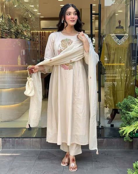 Classic Off-White Embroidered Kurta Set with Delicate Lace Accents and Earthy Floral Tones